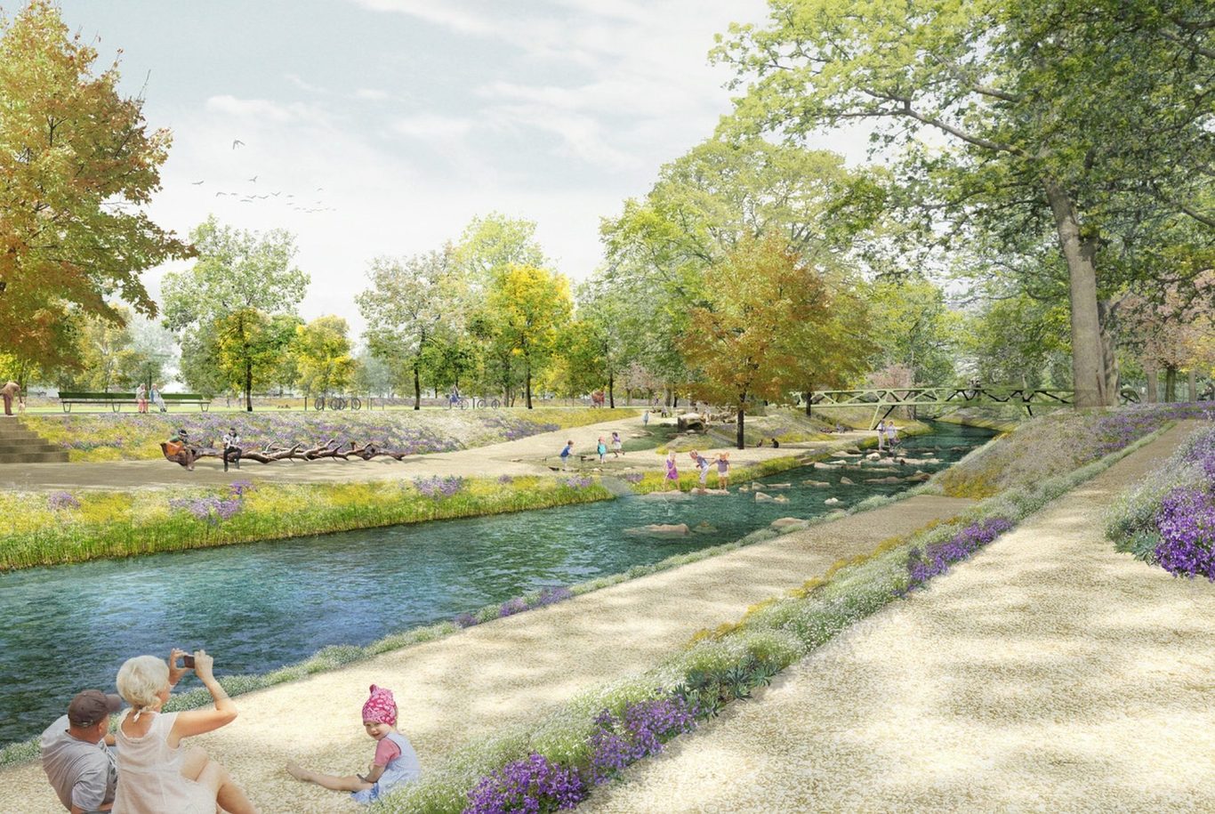 Landschaft mit Fluss, Bäumen und Spaziergängern entlang eines Weges.